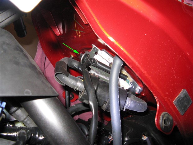 Fuel pump wiring harness clamp
