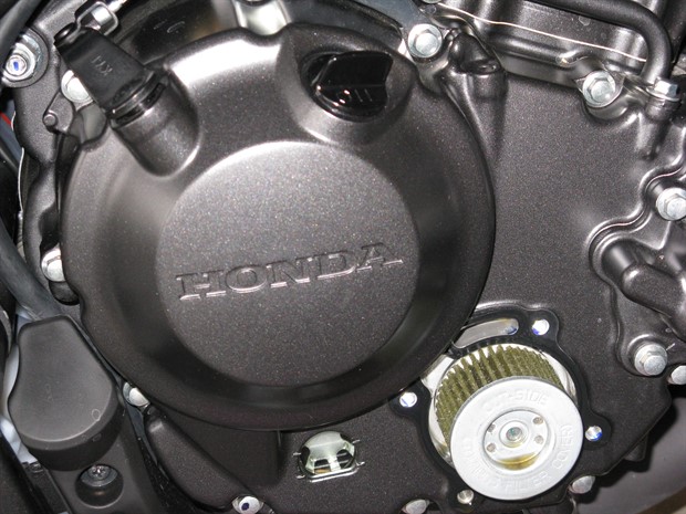 2012 Honda CBR250RA oil filter cover removed