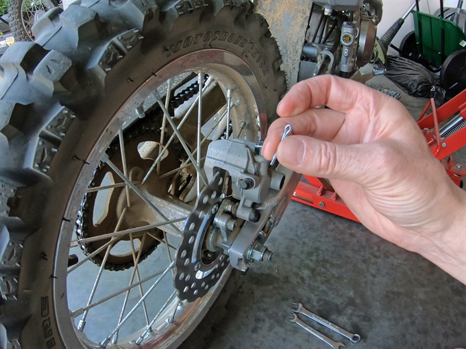 Install a new cotter pin in the axle end - KLX140L