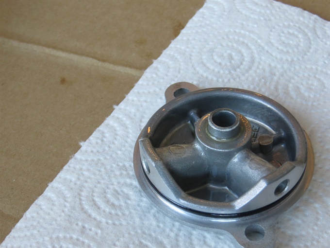 Oil filter cover with O-ring. Note oil passages - CRF250F