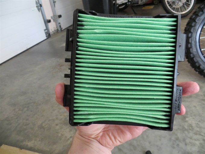 CRF300L air filter with side facing away from engine. Left side with tabs inserted into air box first.