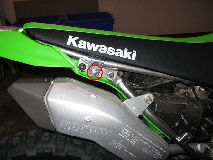 Location of seat bolts (right side shown) - KLX140