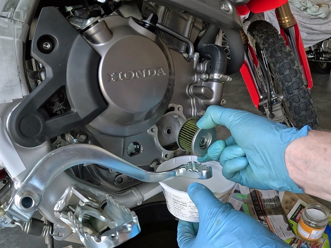 Removing the oil filter, 2023 Honda CRF300L