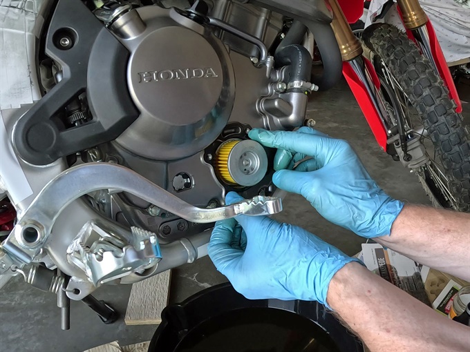 Installing the new oil filter (gasket in place), 2023 Honda CRF300L