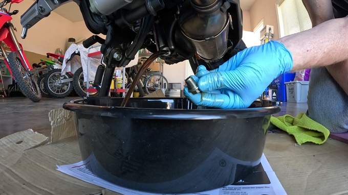 Draining the engine oil, 2024 Honda NX500