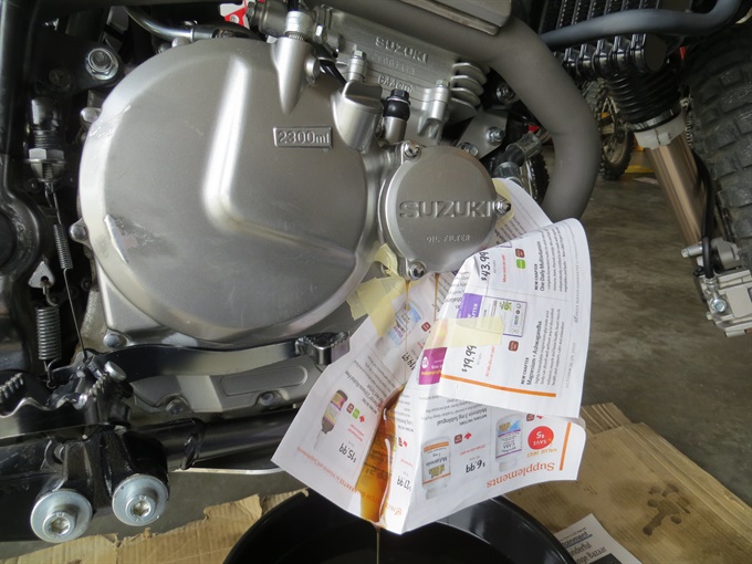 Oil draining from oil filter cover - DR650SE